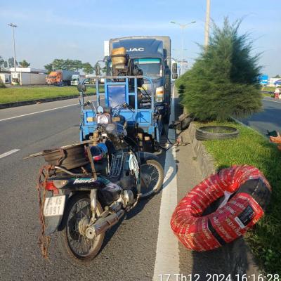 THAY VỎ XE TẢI VĨNH LONG